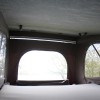 Inside the pop-top roof bed Inside the pop-top roof bed